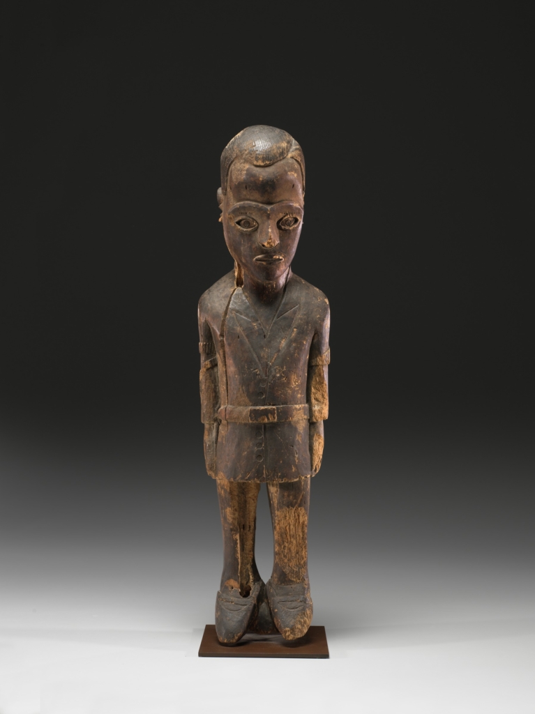 Chief's or Diviner's Figure Representing the Belgian Colonial Officer, Maximilien Balot, circa 1931, Unknown artist (Pende, Democratic Republic of the Congo), wood (possibly Alstonia Boonei) with metal repair staples. Virginia Museum of Fine Arts, Aldine S. Hartman Endowment Fund, 2015.3. Photo by Travis Fullerton © 2015 Virginia Museum of Fine Arts